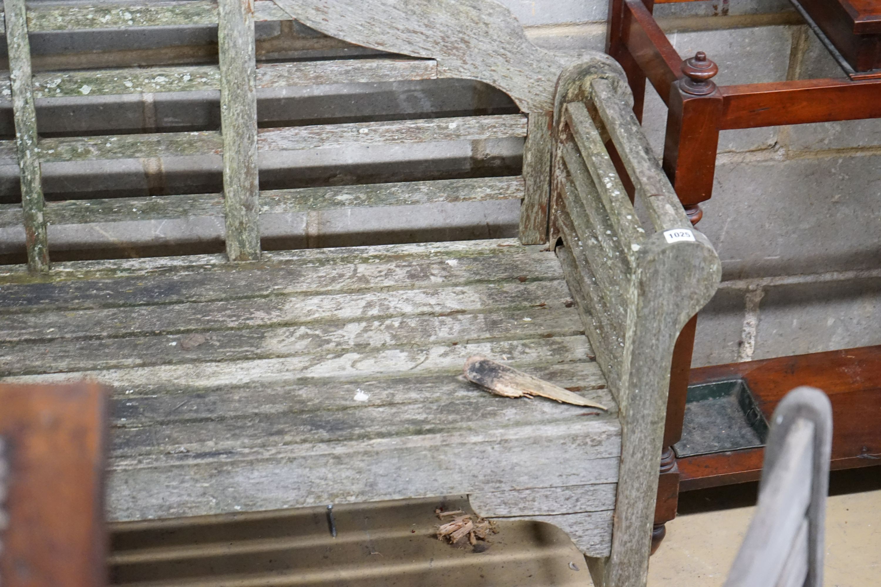 A Lutyens style teak garden bench, length 158cm, depth 51cm, height 98cm